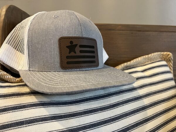 hat on striped fabric